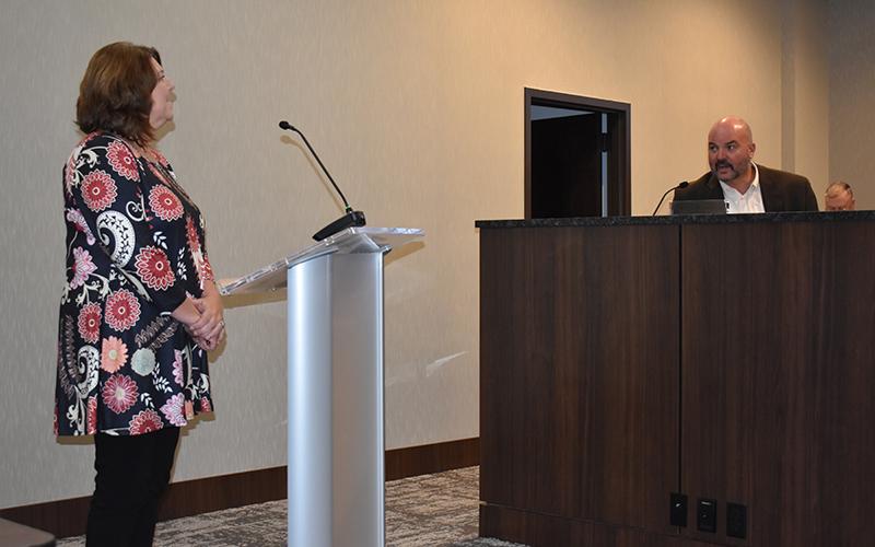 Habersham County Schools’ Counseling Director Daphne Penick talks about her programs while Superintendent Matthew Cooper listens on Wednesday. MATTHEW OSBORNE/Staff