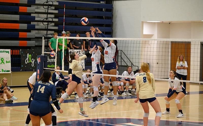 Habersham Central’s Da’Riyah Bell and Katelynn LoBuono get the block on the Apalachee attack and get the point for the Lady Raiders. ZACH TAYLOR/Special