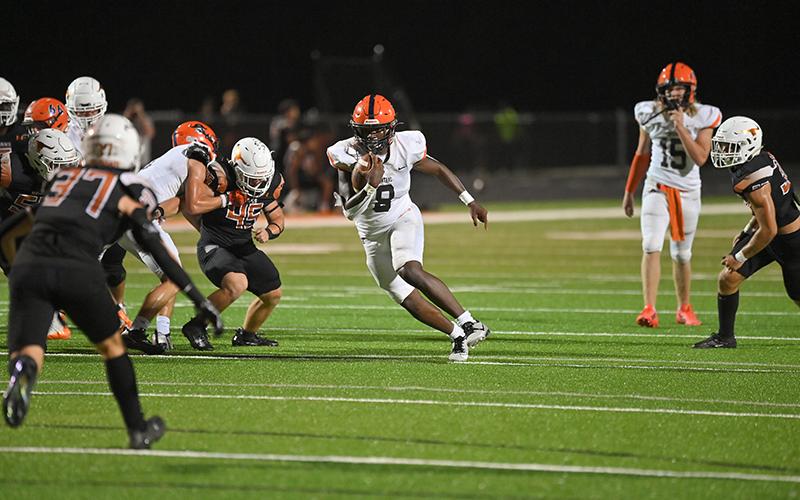 Habersham Central’s Antonio Cantrell finds daylight in the defensive line during Friday night’s game at Lanier. TOM ASKEW/Special