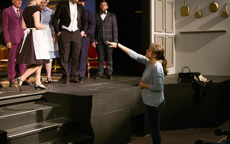 Annabelle Brackett directs cast members during a photo shoot on the ‘Clue’ set. ZACH TAYLOR/Special