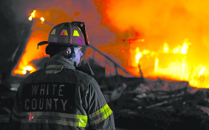 Shift Captain Jody Holland monitors the residential fire. WHITE COUNTY/Submitted