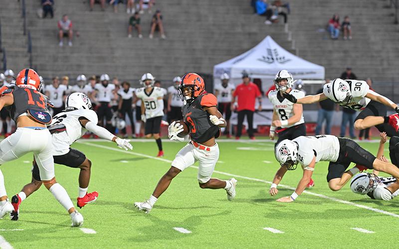 Habersham Central’s Somdee Satiphone Jr. returns the opening kickoff of the Jackson County game for a touchdown. Satiphone and 17 other seniors will be honored tonight before the North Forsyth game. TOM ASKEW/Special