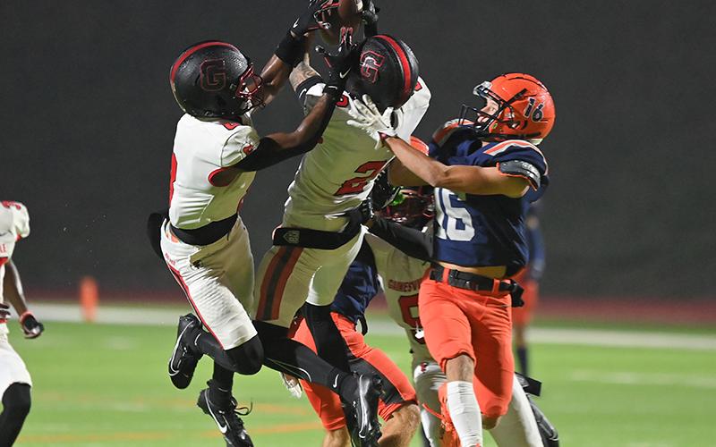 Gainesville’s Nicholas Taylor breaks up a pass intended for Habersham Central’s Maverick Chitwood (16) during Friday night’s game. TOM ASKEW/Special