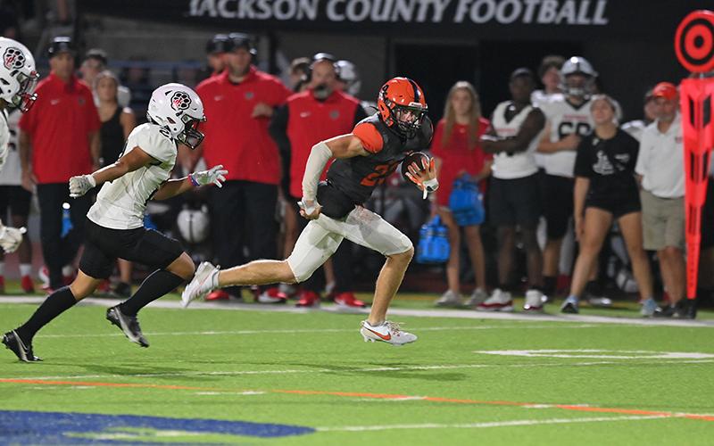 Habersham Central’s Carter Barrett has always been a defensive stalwart, but his impact on offense is increasing every week, including this 70-yard  touchdown against Jackson County last week. The Raiders are off tonight before taking on Gainesville at home Oct. 13. TOM ASKEW/Special