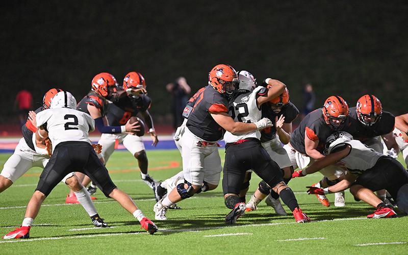 Habersham Central’s Jacob Adams helps open a hole for the ballcarriers against Jackson County. TOM ASKEW/Special
