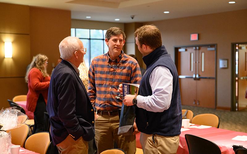 Former Georgia Department of Agriculture Commissioner Gary W. Black speaks with Sen. Bo Hatchett and Brian Horton. ZACH TAYLOR/Special