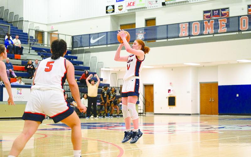 Daytona Underwood pulls up for a 3-point shot in the season opener against East Hall. ZACH TAYLOR/Special