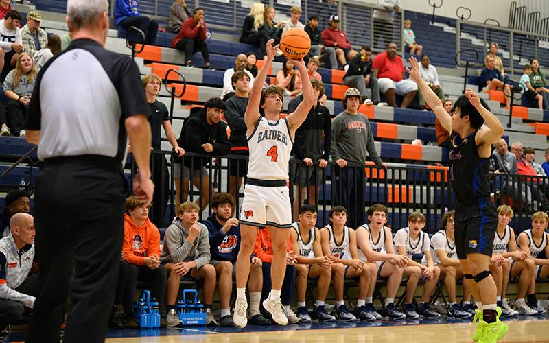 Habersham Central’s Brannon Gaines pulls up for three in front of the Habersham Central bench. ZACH TAYLOR/Special
