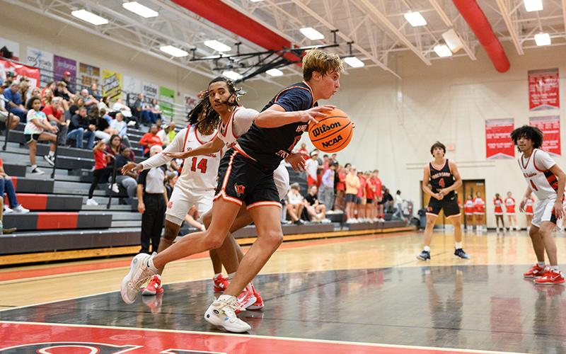 Habersham Central’s Judge Wilbanks tip-toes the baseline as he strides toward the rim. ZACH TAYLOR/Special