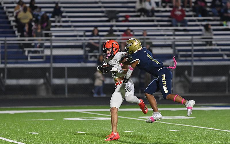Habersham Central’s Zeke Whittington hauls in a catch on his way to a new school career record for receptions. TOM ASKEW/Special