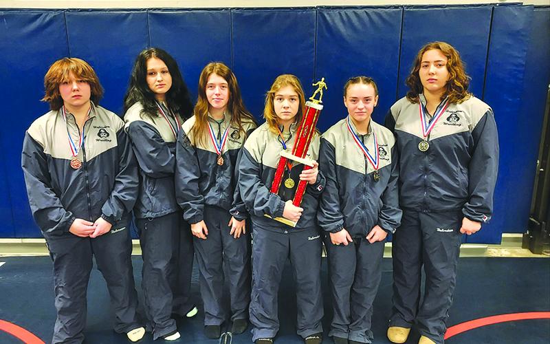SUBMITTED Habersham medalists Carleigh Brawn, Gracie Abernathy, Hayley Speed, McKenzie Spradley, Natalie Spillers and Melia Mead pose with the Arrowhead Classic runner-up trophy. SUBMITTED