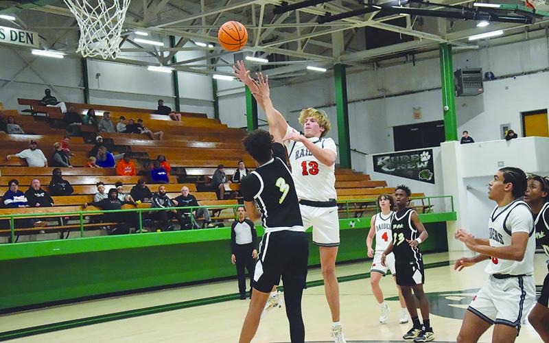 Judge Wilbanks takes it to the hole with a floater. SHANE SCOGGINS/CNI News Service