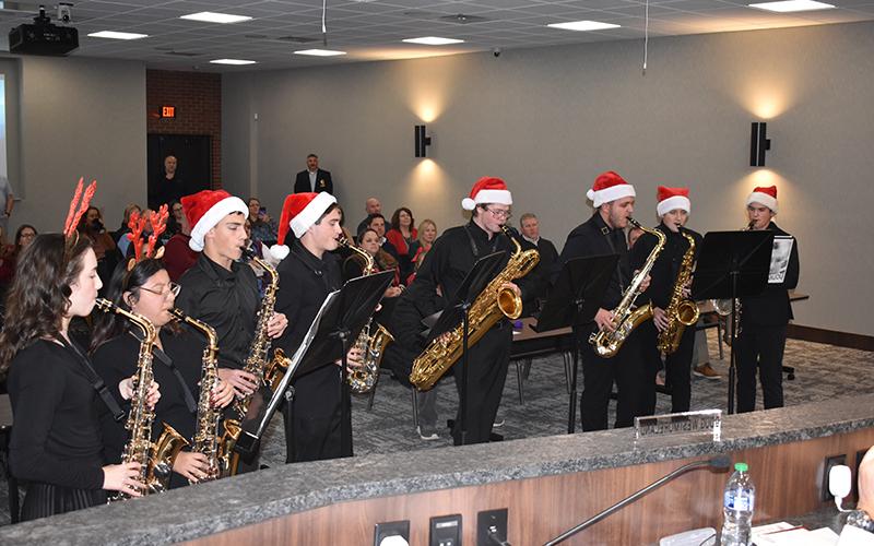 Habersham Central’s Saxophone Choir performed for the Board of Education on Monday, playing “You’re a Mean One, Mr. Grinch” from music the students arranged. Performers are (from left) Sarah Morris, Ash Rodriguez, Landon Noggle, Trey Heumaneus, Michael McDuffie, Kaleb Adams, Matthew Anderson and Joshua Burris. MATTHEW OSBORNE/ Staff