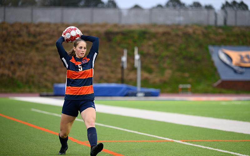 Habersham Central’s Piper Turner throws the ball back in during a match against Lanier last season. ZACH TAYLOR/File