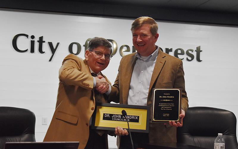Dr. John Hendrix then was honored by Mayor Jerry Harkness in his final meeting on the council. MATTHEW OSBORNE/Staff