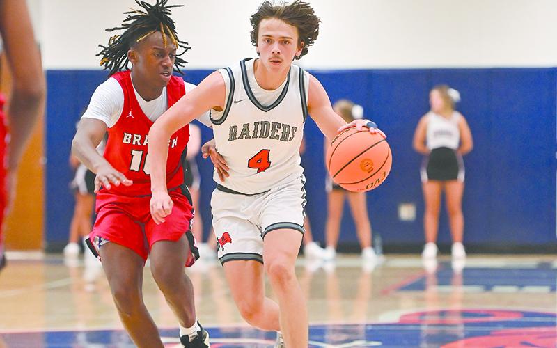 Habersham Central’s Brannon Gaines sprints down court against Flowery Branch earlier this season. TOM ASKEW/Special