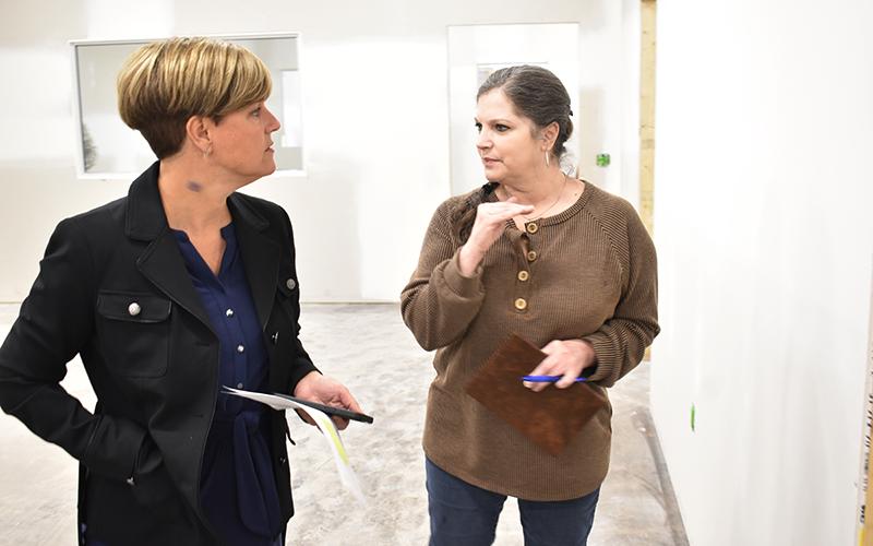 Habersham County Manager  Alicia Vaughn (left) and Elections Supervisor Laurel Ellison tour the new headquarters in Cornelia on Wednesday. MATTHEW OSBORNE/Staff