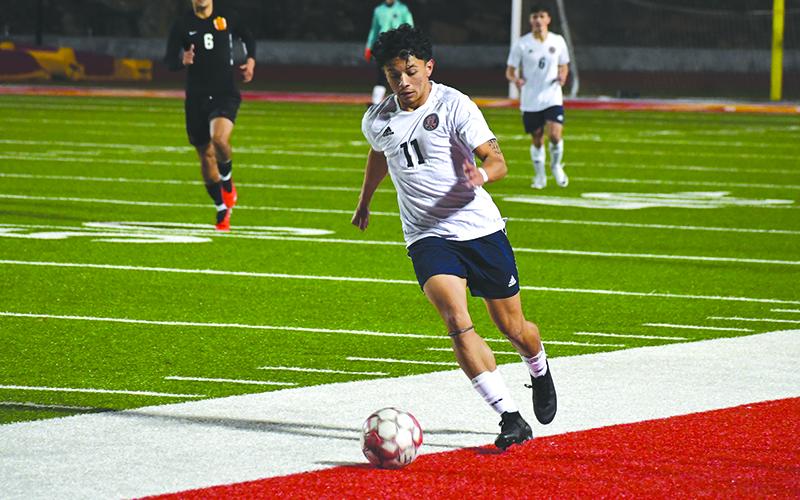 Habersham Central’s Xavier Lopez turns upfield during Monday’s exhibition. LANG STOREY/Staff