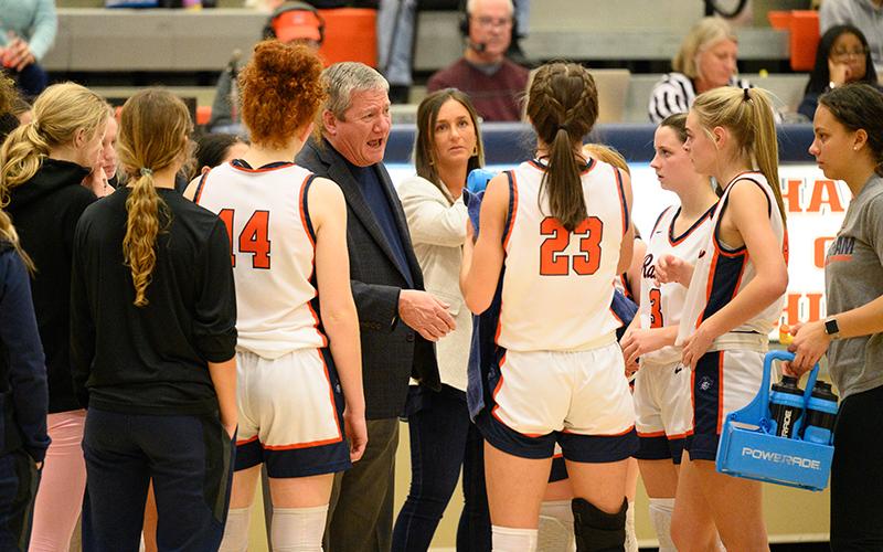 Lady Raiders coach Bill Bradley gives his players instructions during a time out. The girls take on Apalachee and North Forsyth this weekend. ZACH TAYLOR/Special