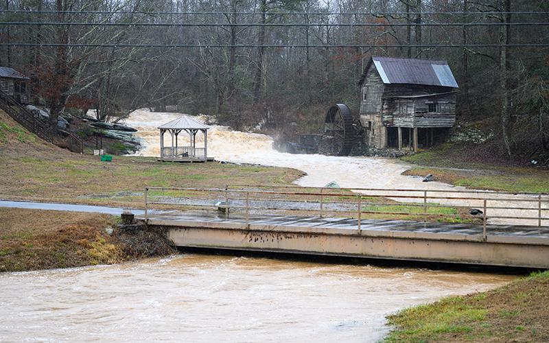 Loudermilk Mill on Highway 197 is flooded after the rain from Monday into Tuesday. The water level has risen and is close to reaching the bridge that leads to the home on the hill adjacent to the mill. ZACH TAYLOR/Special