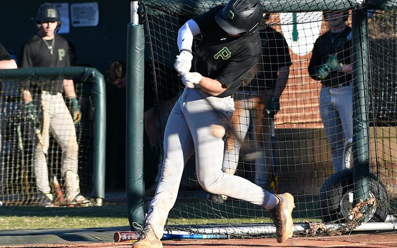 Piedmont freshman infielder Kaden Stephenson gets some work in at batting practice last week. LANG STOREY/Staff