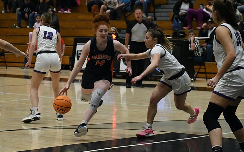 Habersham Central’s Daytona Underwood drives against a North Forsyth defender. LANG STOREY/Staff