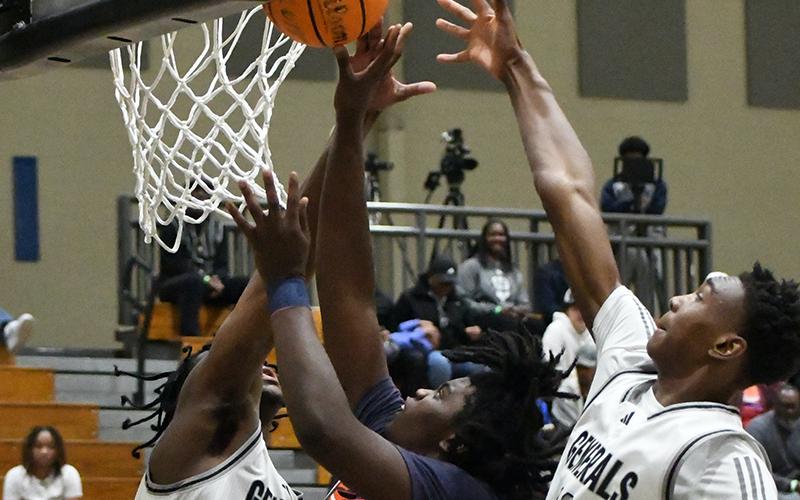 Habersham Central big man JoJo McCury goes in amongst the trees against Shiloh on Friday night. LANG STOREY/Staff