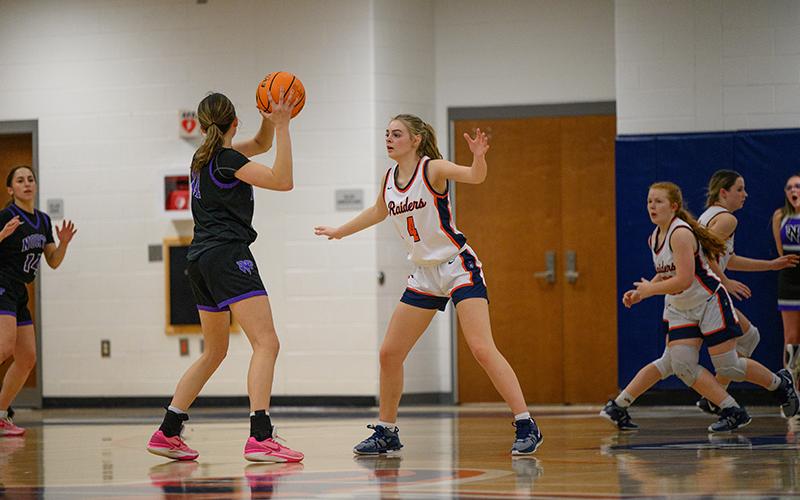 Lady Raiders senior Sophie Bramlett gets set on defense against North Forsyth on Friday night. More Senior Night pics, pages 4-5B. ZACH TAYLOR/Special