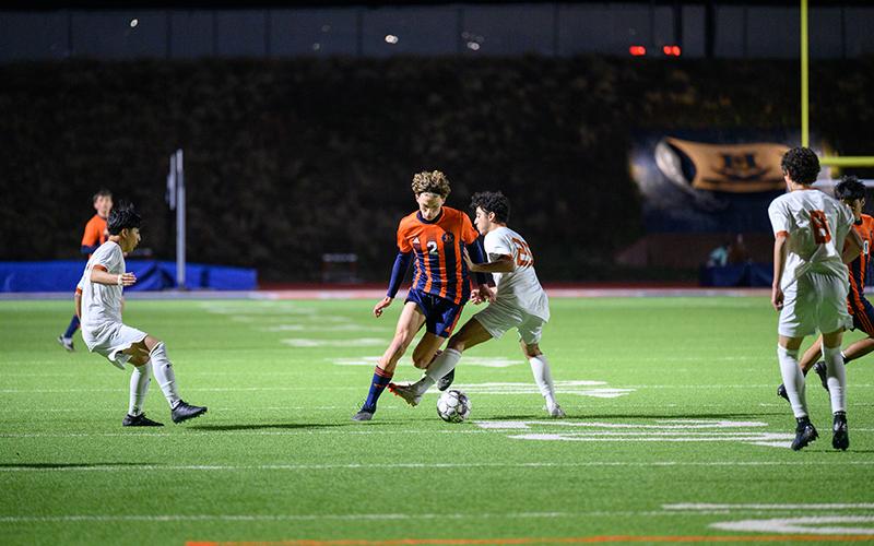 During Friday night’s game, Habersham’s Owen Wallace strides through three defenders in the midfield. ZACH TAYLOR/Special
