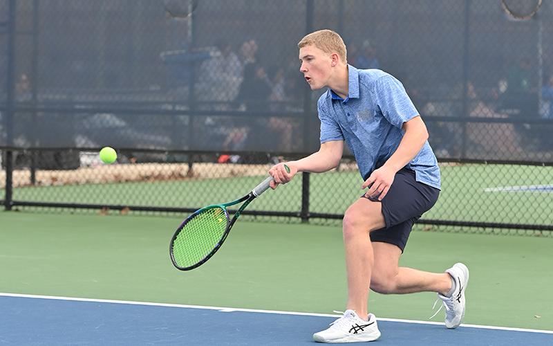 Habersham Central’s Lije Smith returns a shot during a recent home match. LANG STOREY/Staff