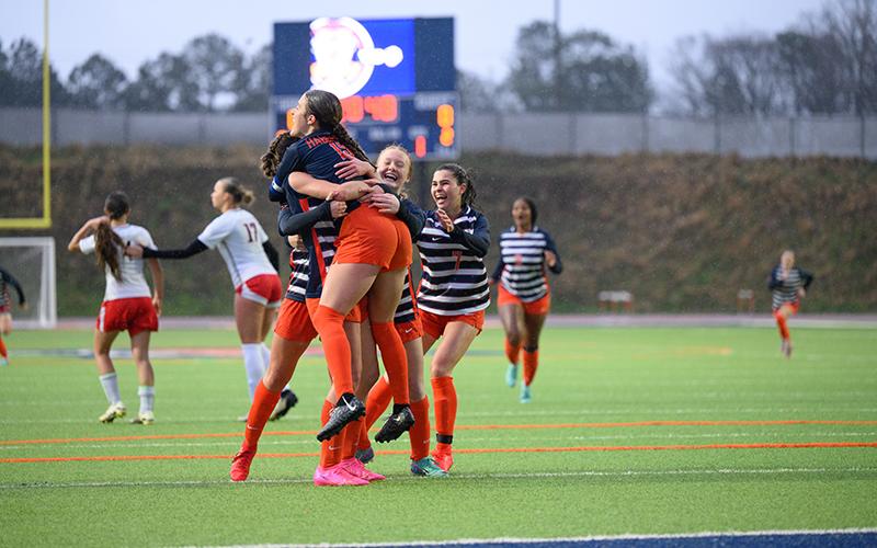 Habersham Central’s Paisley Cathey gets hugs from teammates after converting a penalty kick in the second half Friday night. ZACH TAYLOR/Special