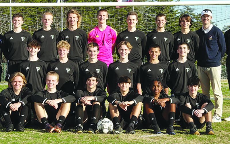 Members of the Tallulah Falls varsity boys soccer team are (front row, from left) Nick Edenfield, Jacob Mitchell, Alvaro Garcia Breton, Heath Booker, Versean Lynes and Koen Eller. Middle row are (from left) Tyson Hall, Jared Mullis, Landon Hall, Eli Damron, Clay Kafsky and Austin Ball. Back row are (from left) Coach Travis Mullis, Jackson Cording, Josiah Turney, Laith Reynolds, Kelton Reynolds, Jakob Wehrstein, Britton Shaw, Kale Borcher, Coach Jeremy Stille and Manager Cole Borchers. STRAWBRIDGE STUDIOS