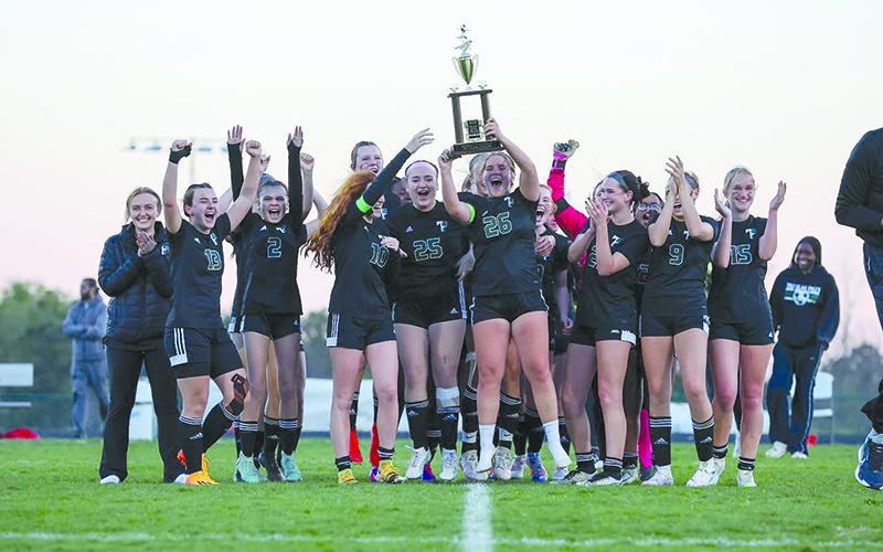 Tallulah Falls’ girls soccer team celebrates a region championship on Friday night. AUSTIN POFFENBERGER/Special