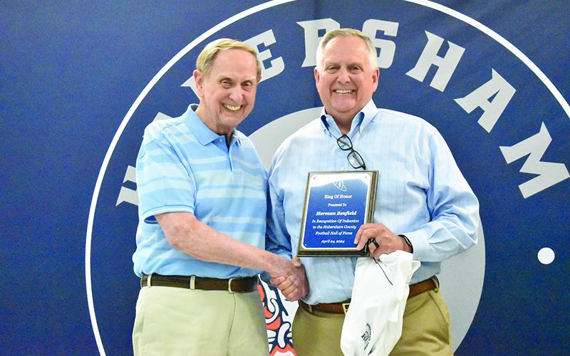 Herman Benfield (left) was inducted by his son Brian. MATTHEW OSBORNE/Staff
