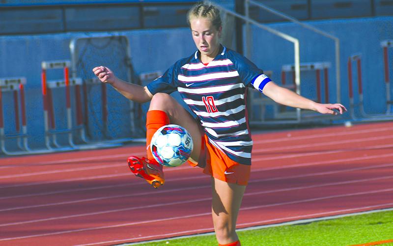 Addi Banks shows off her dribbling skills during the playoff win. LANG STOREY/Staff