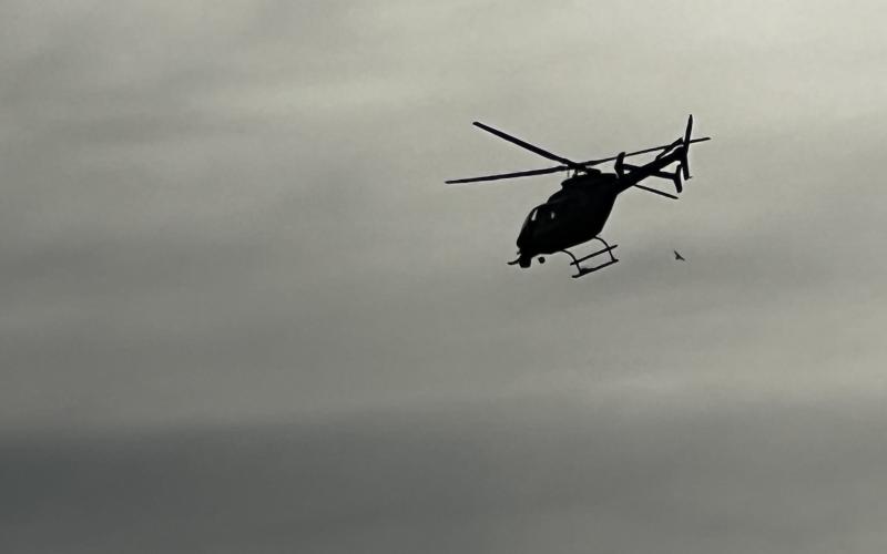 A helicopter assists with the search for three fugitives in Clarkesville. ZACH TAYLOR/Special
