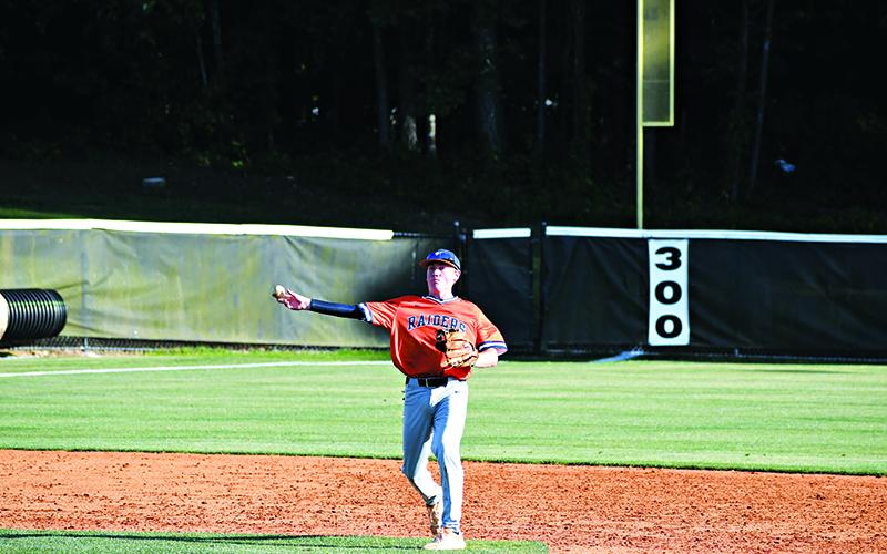 Raiders shortstop Hayden Gailey fires a ball across the infield Wednesday. LANG STOREY/Staff