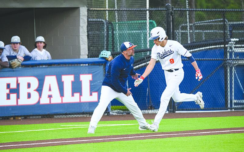 Habersham Central’s Konner Burrell gets congratulated by Coach Chris Akridge after a home run earlier this season. ZACH TAYLOR/Special