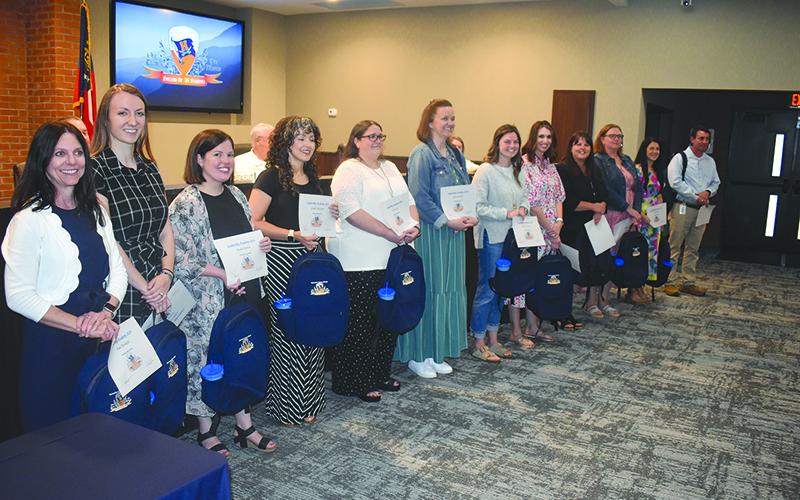 The Board of Education honored the 2024 graduates of the Leadership Academy on Monday night. Shown are (from left) Pam Threlkeld, Claire Steverson, Keylia Patton, Gisela McGugan, Dora Lucas, April LaHayne, Melanie Jackson, Ashley Ivester, Kristy Hallford, Stacey Gailey, Lauren Fair and Ben Bolton. MATTHEW OSBORNE/Staff