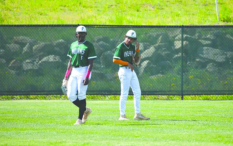 Tallulah Falls outfielders Danny Grant (left) and BJ Carver prepare for the next inning. Grant was the region’s player of the year. LANG STOREY/Staff
