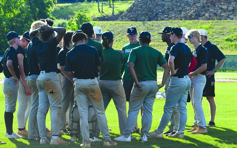Coach AJ Pollock addresses his team during practice Wednesday. The team left for Statesboro on Thursday evening to prepare for today’s state championship games. LANG STOREY/Staff