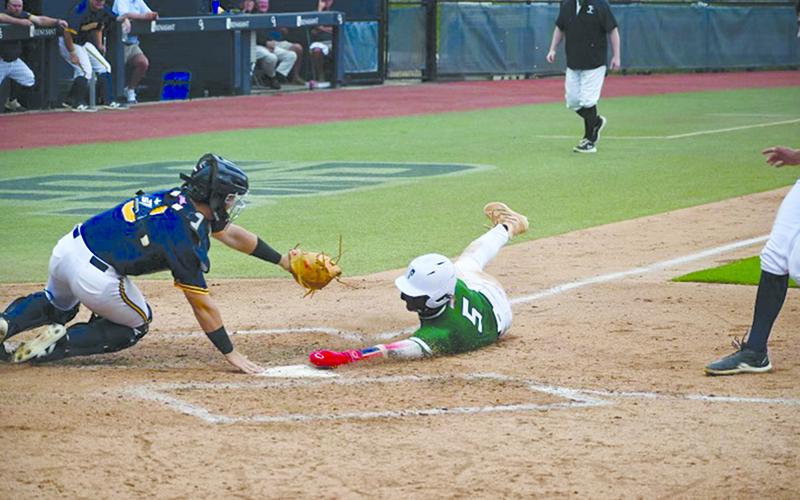 Danny Grant was called out on this play in the top of  the sixth inning, negating what could have been the winning run. WADE CHEEK/CNI News Service