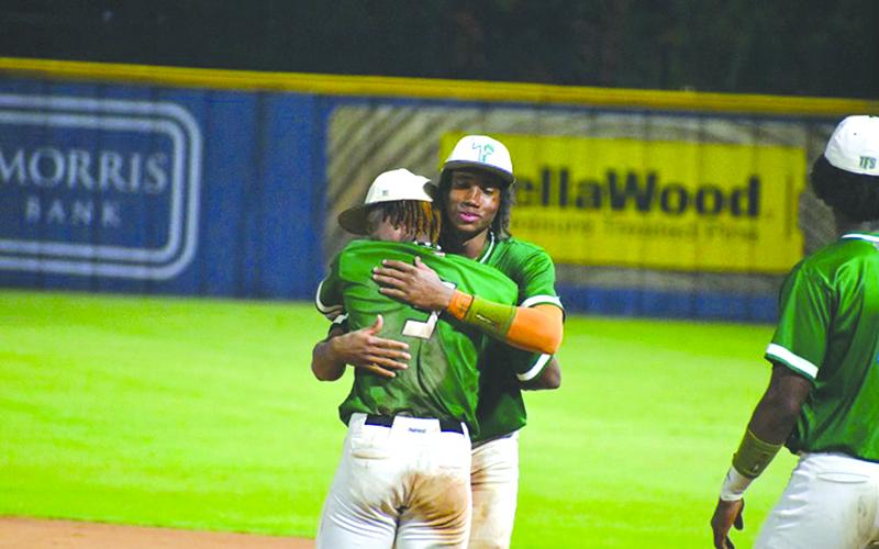 Tallulah Falls’ Danny Grant and Caden Walker embrace after the final loss to Prince Avenue Christian School on Friday. WADE CHEEK/CNI News Service