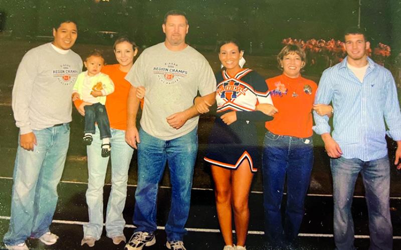 Three decades of Raiders celebrate Brooke Roberts’ senior night as a Habersham Central cheerleader in the fall of 2007. From left: Ray Contreras, Kali Contreras (as a baby), Brittany Contreras, Mike Roberts, Brooke Roberts, Terri Roberts and Matt Roberts. SUBMITTED