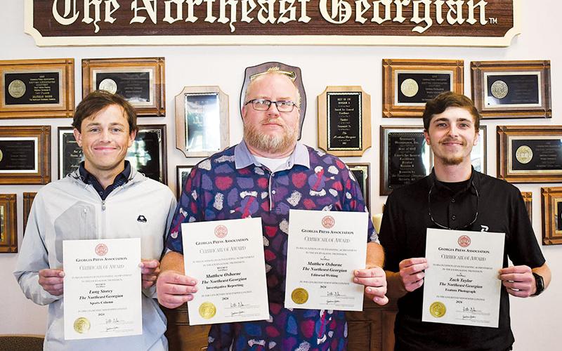Award winners from The Northeast Georgian for the Georgia Press Association’s 2023 contest are (from left) Lang Storey, Matthew Osborne and Zach Taylor. Not pictured is freelance photographer Tom Askew, who also was awarded.