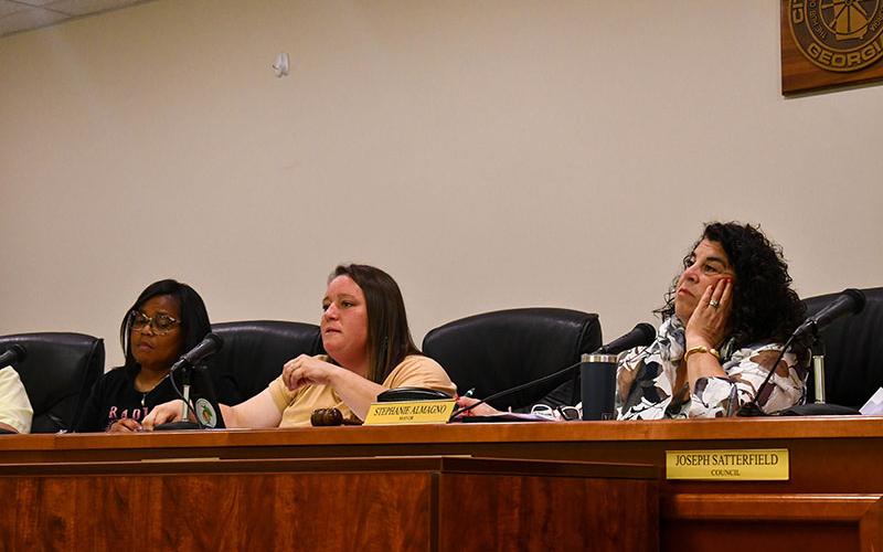 Baldwin Councilwoman Alice Venter speaks at Monday's meeting as Councilwoman Kerri Davis (left) and Mayor Stephanie Almagno listen.