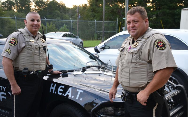 In 2021, former HEAT unit deputy Kris Hall and Deputy Brandon Holcomb show off the Habersham County Sheriff’s Office’s haul of awards from the Golden Shield Honors. MATTHEW OSBORNE/Staff