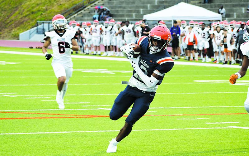 Habersham Central’s Jay Feltus scores a touchdown during the spring game against Hart County. LANG STOREY/Staff