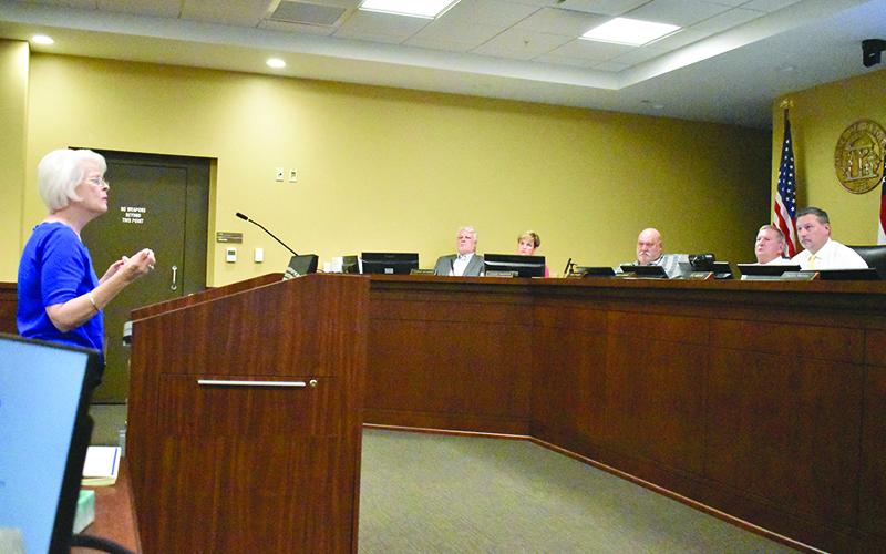 Paula Hannington of Clarkesville talks about the budget while the Board of Commissioners listens at Monday’s meeting. MATTHEW OSBORNE/Staff