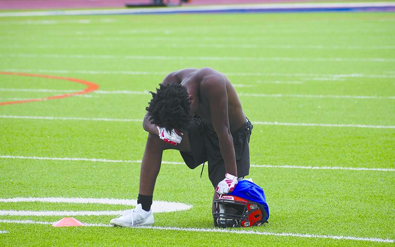 Habersham’s Braden Strickland looks to recover in the early summer weather. LANG STOREY/Staff